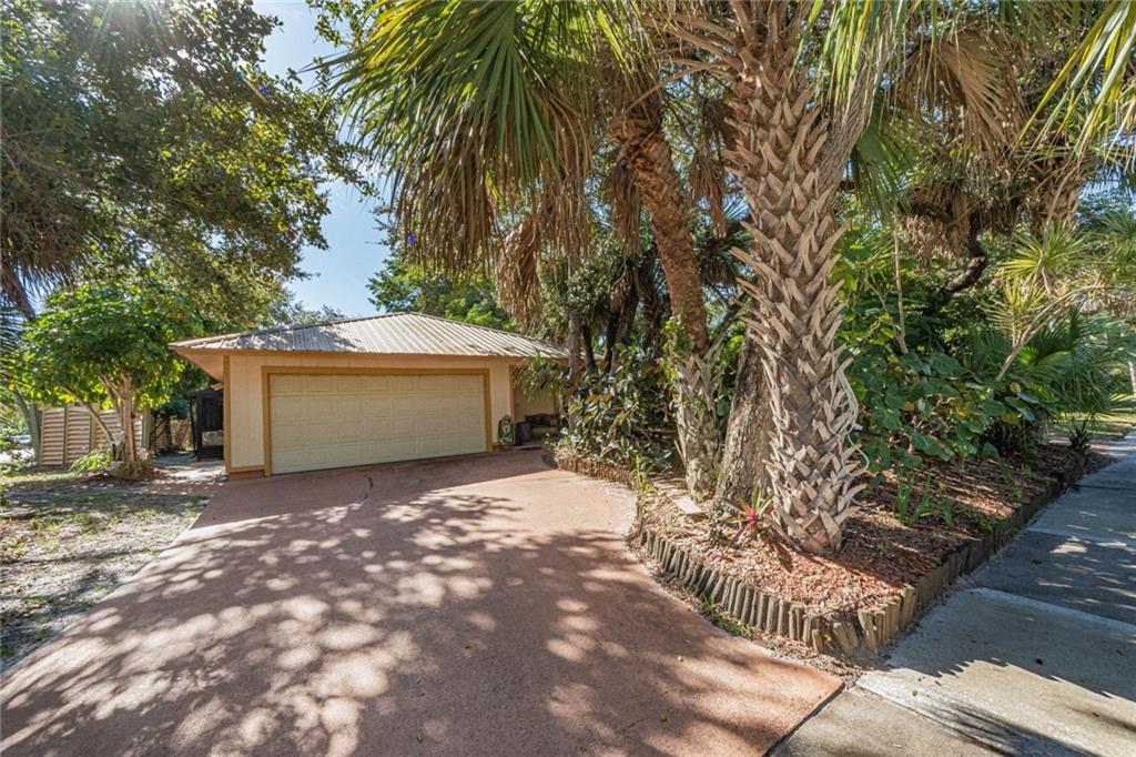 670 Cypress Road Vero Beach, FL 32963 - Photo 4 of 20 a view of a house with a yard