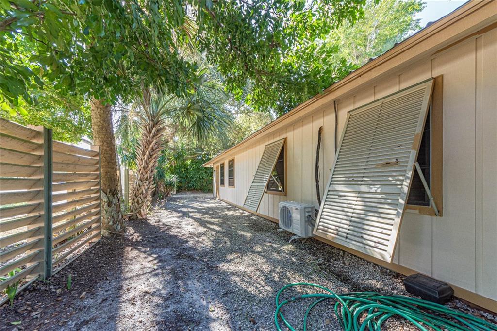 670 Cypress Road Vero Beach, FL 32963 - Photo 6 of 20 a view of a house with a yard