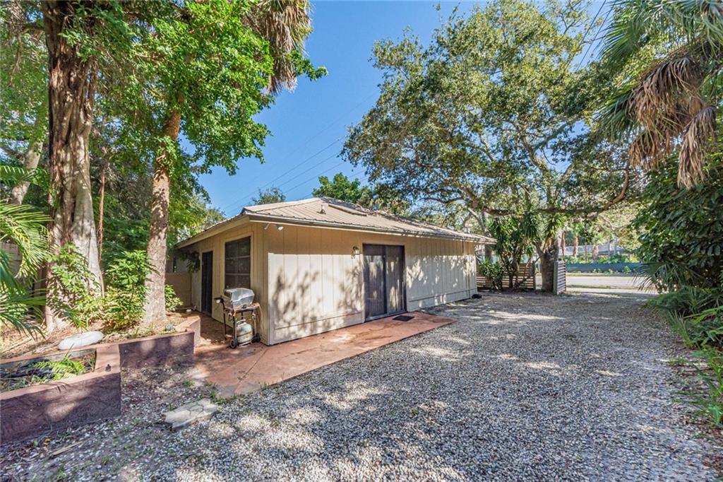 670 Cypress Road Vero Beach, FL 32963 - Photo 7 of 20 a view of a house with a yard