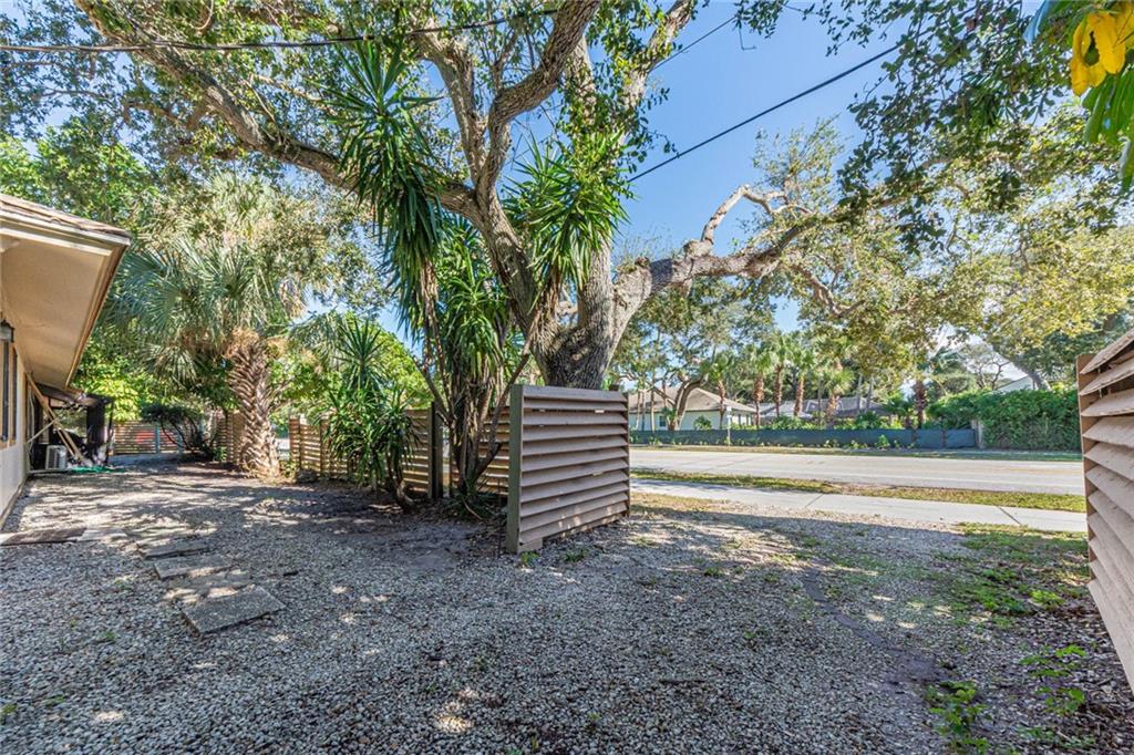 670 Cypress Road Vero Beach, FL 32963 - Photo 8 of 20 a view of a outdoor space and trees