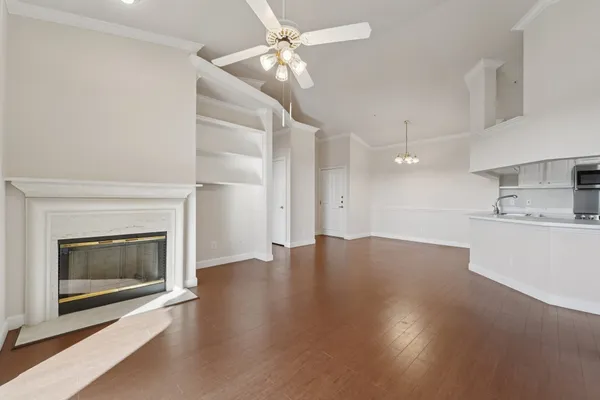 a kitchen with stainless steel appliances a refrigerator sink and cabinets