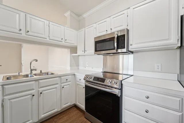 a view of a house with a snow on the road