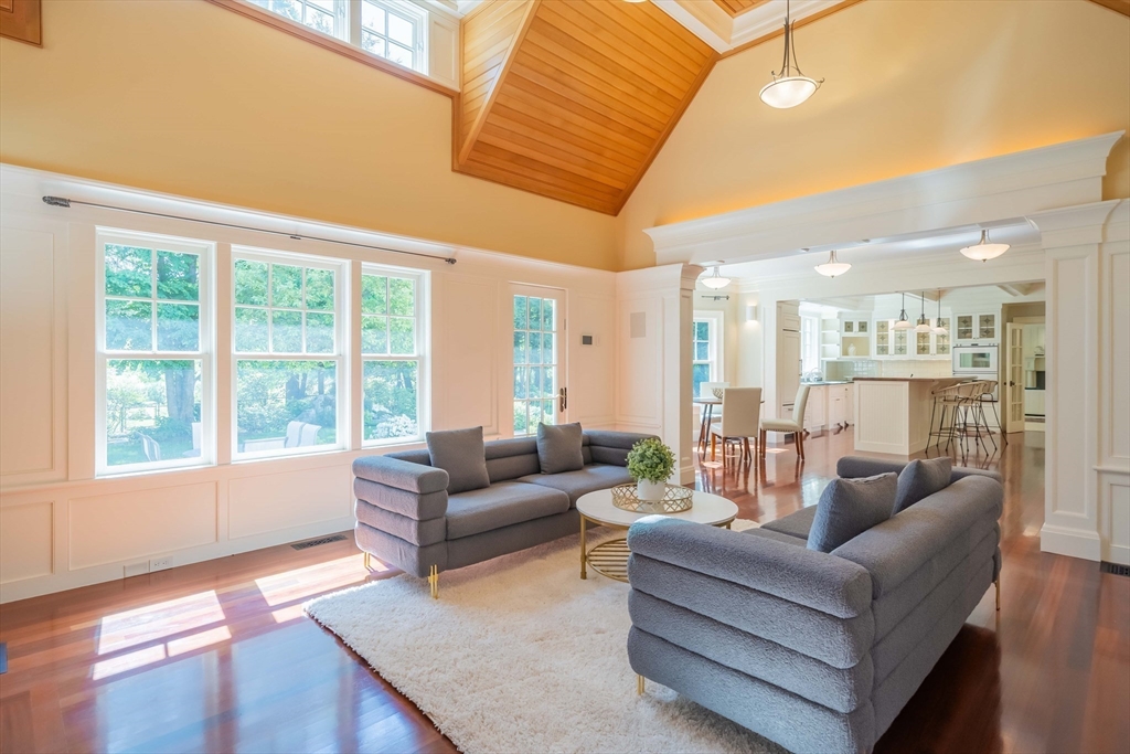 197 Grant Street Lexington, MA 02420 - Photo 15 of 42 a living room with furniture and a large window