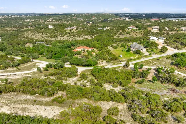 a view of a yard with an outdoor space