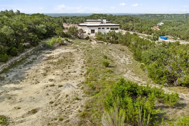 a view of city with ocean