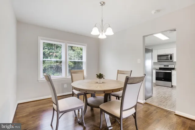 a bathroom with a large tub and sink