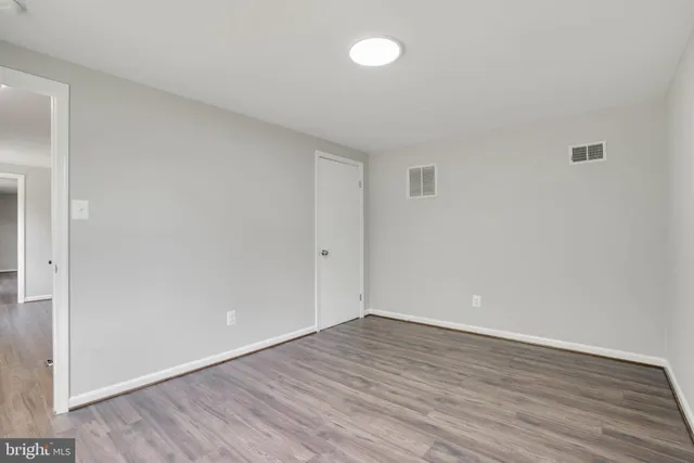 a view of yard with swimming pool and green space