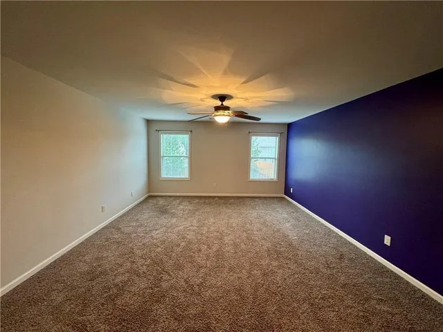 an empty room that has a window