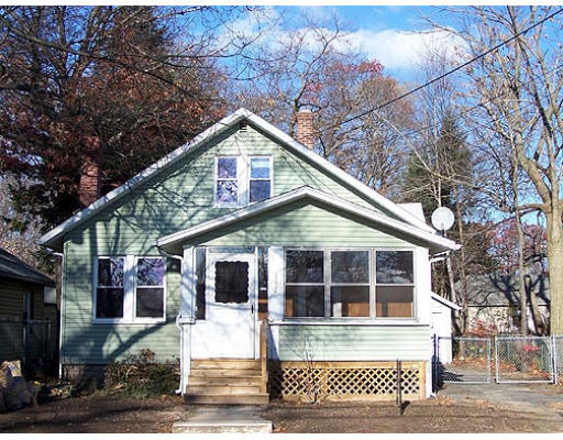 1384 Bay Street Springfield, MA 01109 - Photo 1 of 2 a front view of a house with a yard