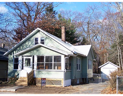 1384 Bay Street Springfield, MA 01109 - Photo 2 of 2 a front view of a house with a yard