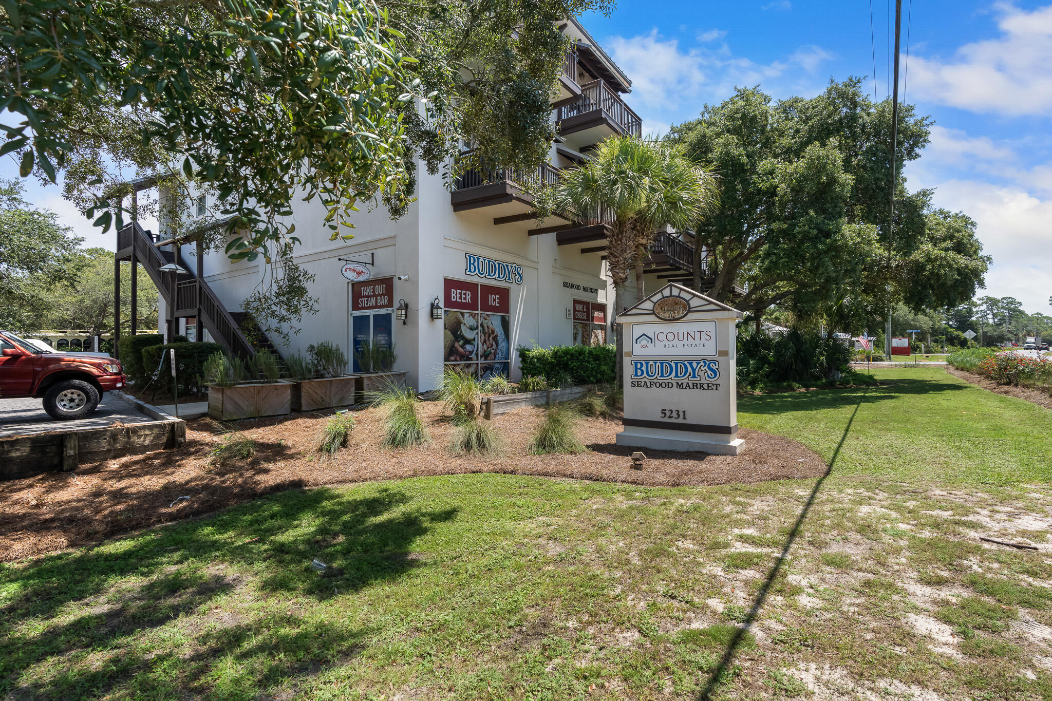 34 Heron's Watch Way, Unit 7205 Santa Rosa Beach, FL 32459 - Photo 49 of 49 a view of a house with backyard and a tree