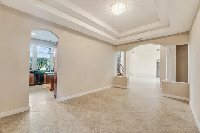 a view of a yard with a palm trees