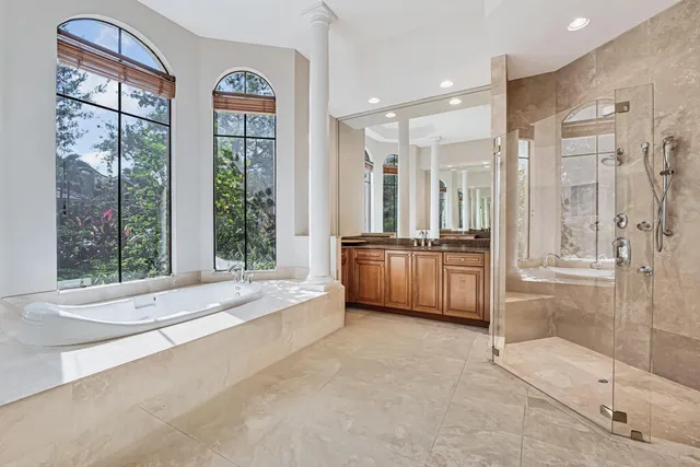 a view of entryway of house and hall with wooden floor