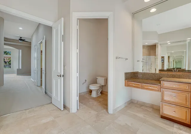 a living room with furniture or couch and a chandelier