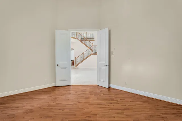 a view of a dining hall with lots of tables and chairs