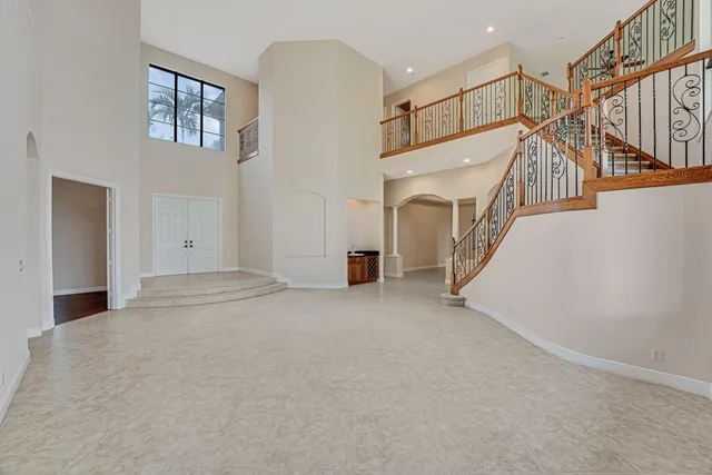 a kitchen with stainless steel appliances granite countertop a stove and a refrigerator