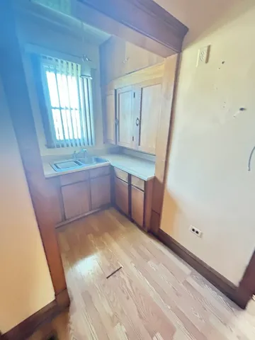 a room with window and sink