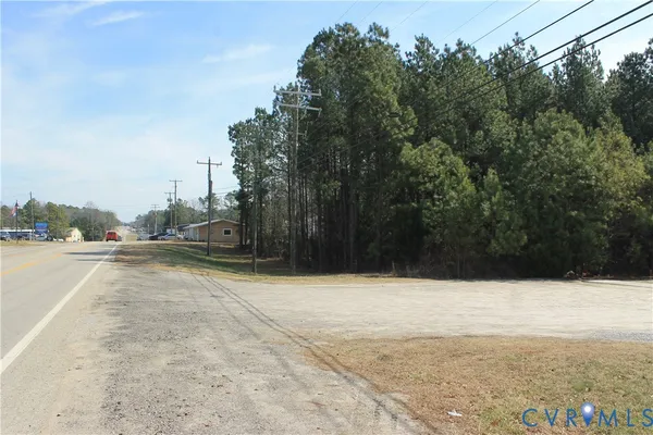 a view of a wooden fence in the backyard