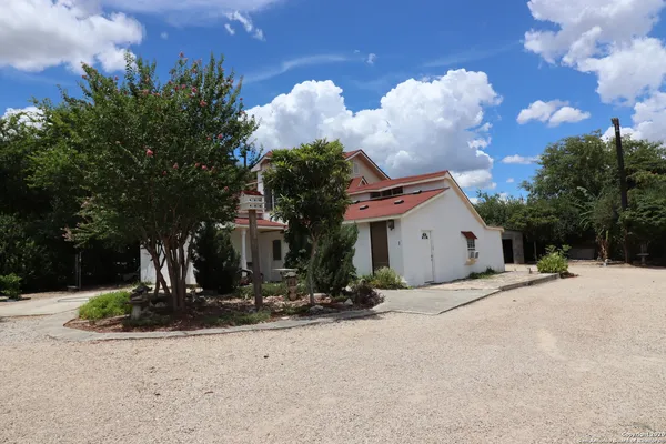 a view of a house with entertaining space