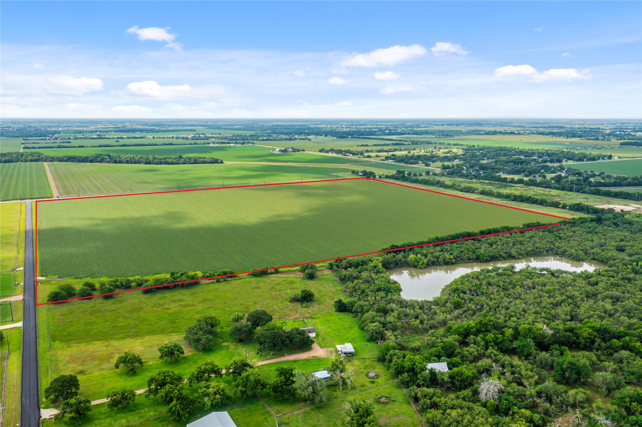0 Kunz Road Rosenberg, TX 77471 - Photo 11 of 18 a view of a golf course with a lake