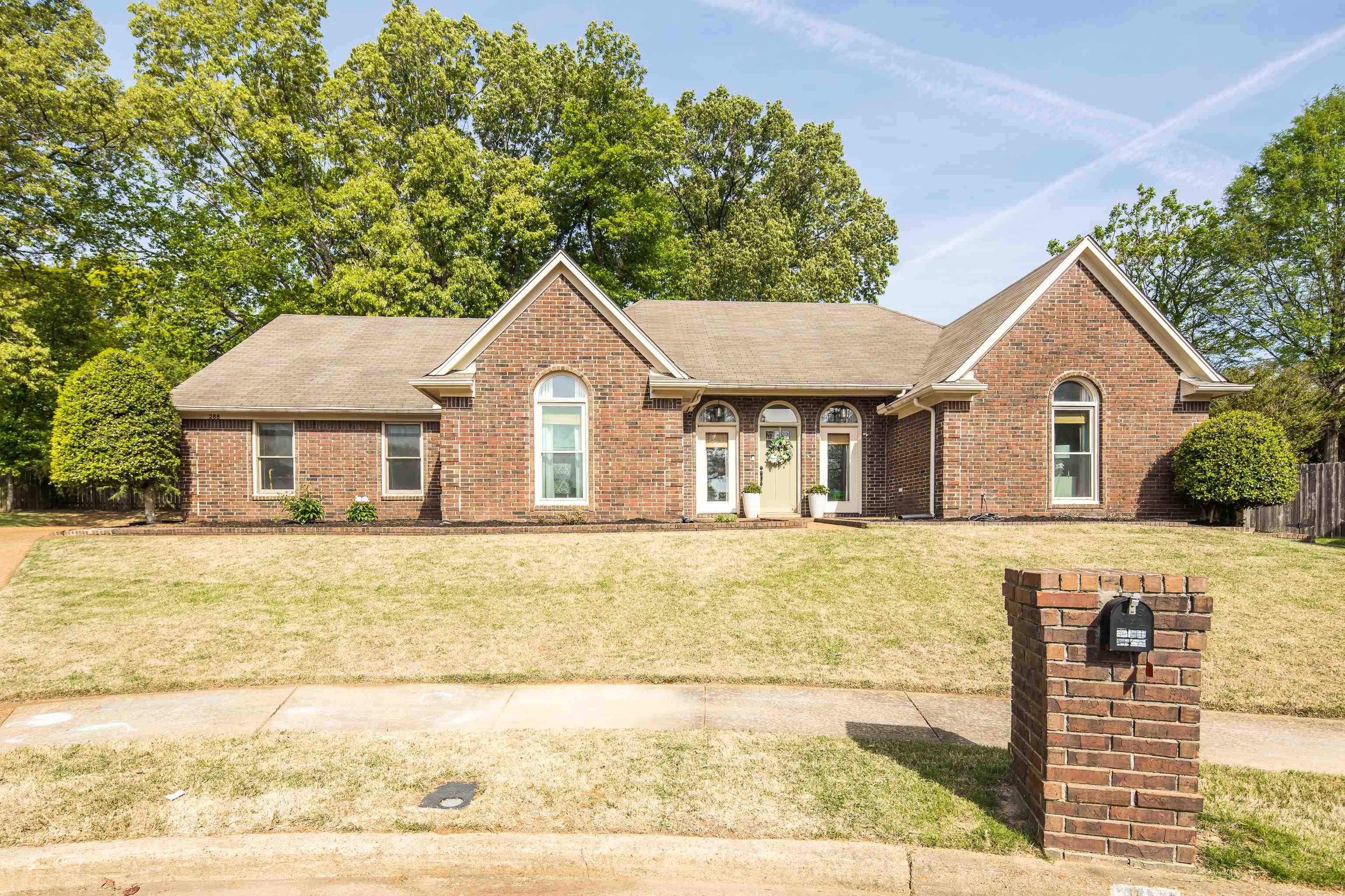 288 Hughes Cove Collierville, TN 38017 - Photo 1 of 31 Ranch-style house featuring a shingled roof and brick siding