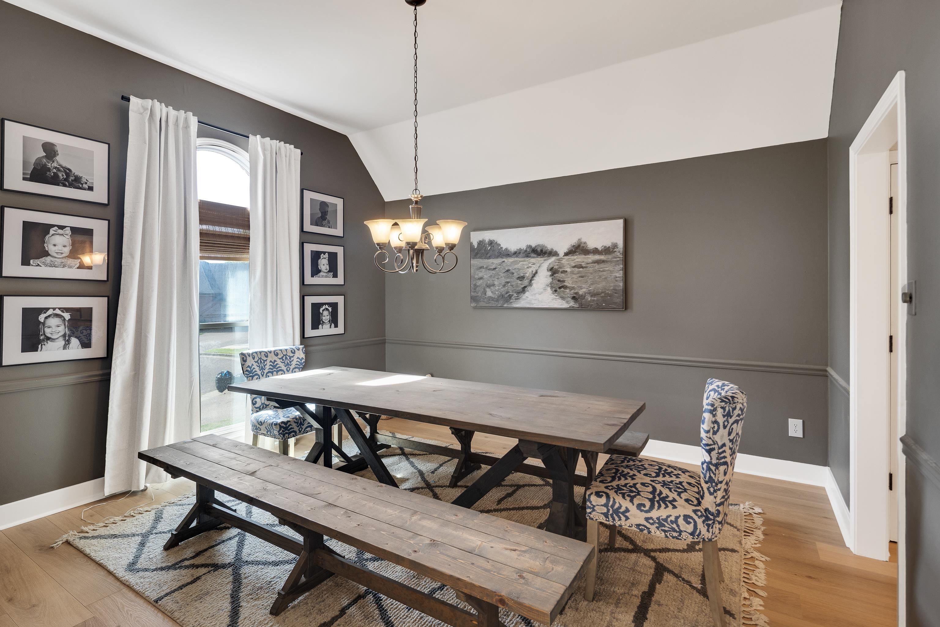 288 Hughes Cove Collierville, TN 38017 - Photo 15 of 31 Dining space with lofted ceiling, light wood finished floors, and suspended lighting
