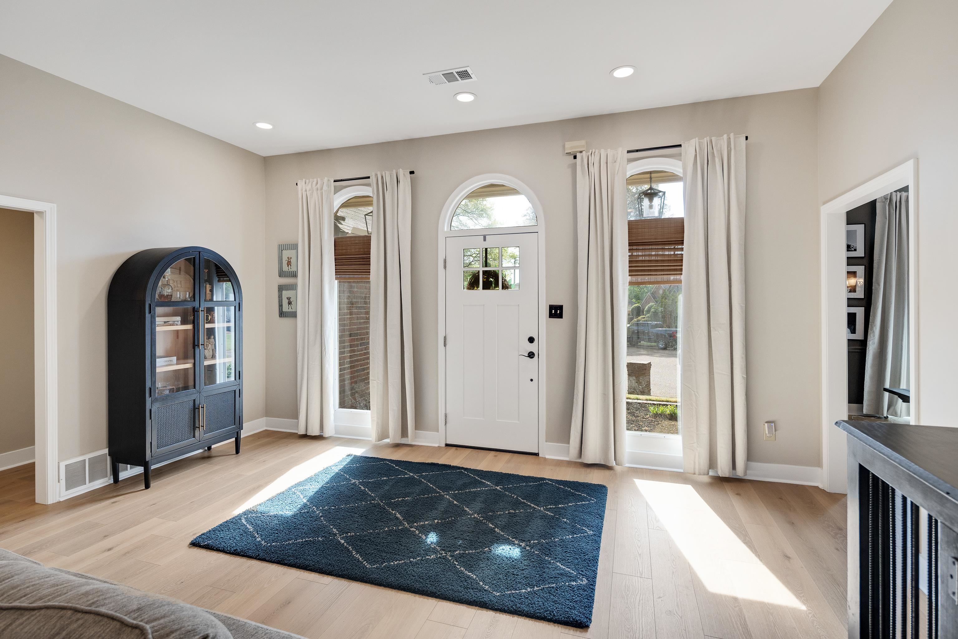 288 Hughes Cove Collierville, TN 38017 - Photo 3 of 31 Foyer entrance with light wood finished floors and recessed lighting
