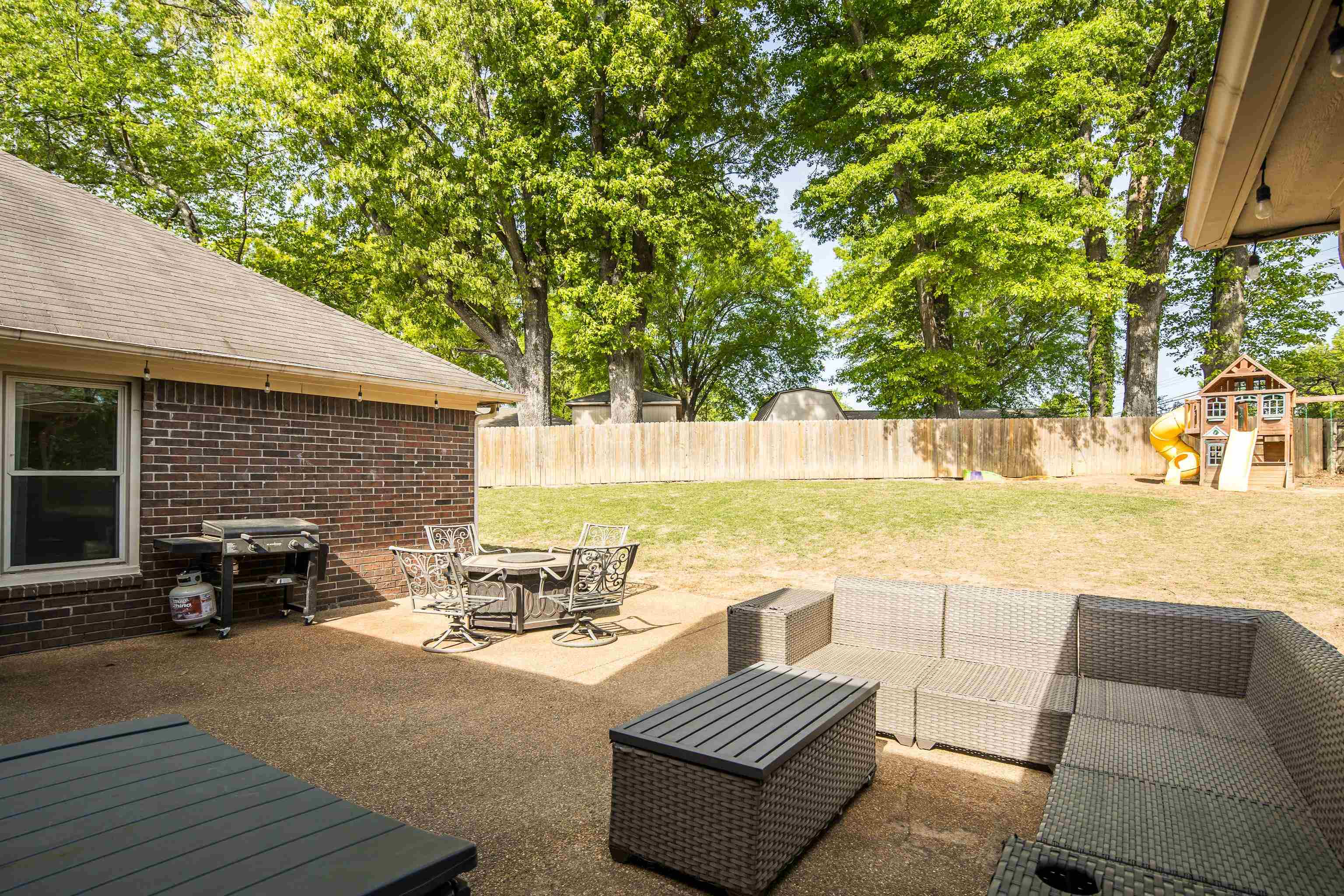 288 Hughes Cove Collierville, TN 38017 - Photo 31 of 31 Fenced backyard with a patio area, grilling area, and an outdoor lounge area