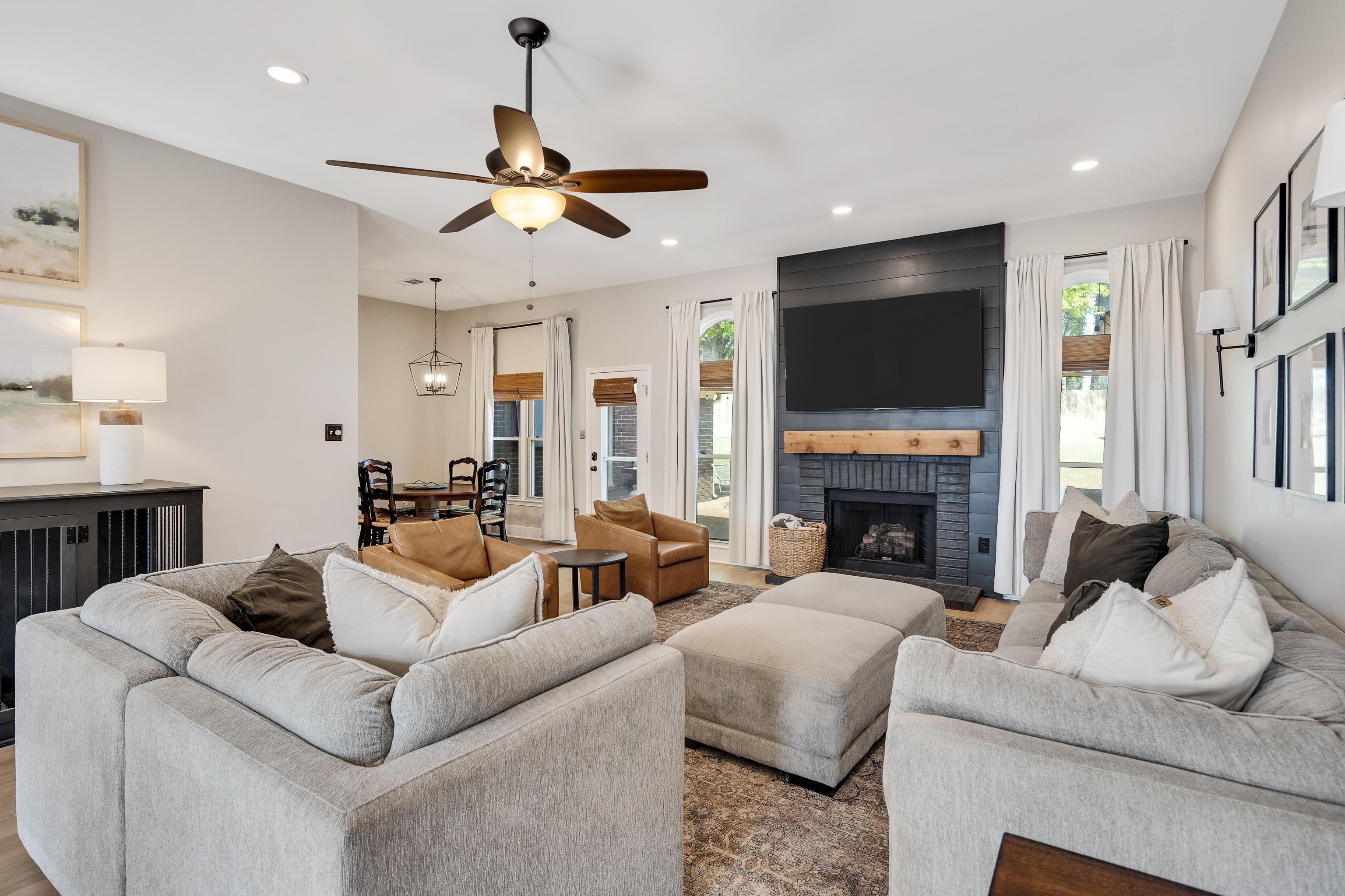 288 Hughes Cove Collierville, TN 38017 - Photo 7 of 31 Living room featuring a brick fireplace, a ceiling fan, and recessed lighting