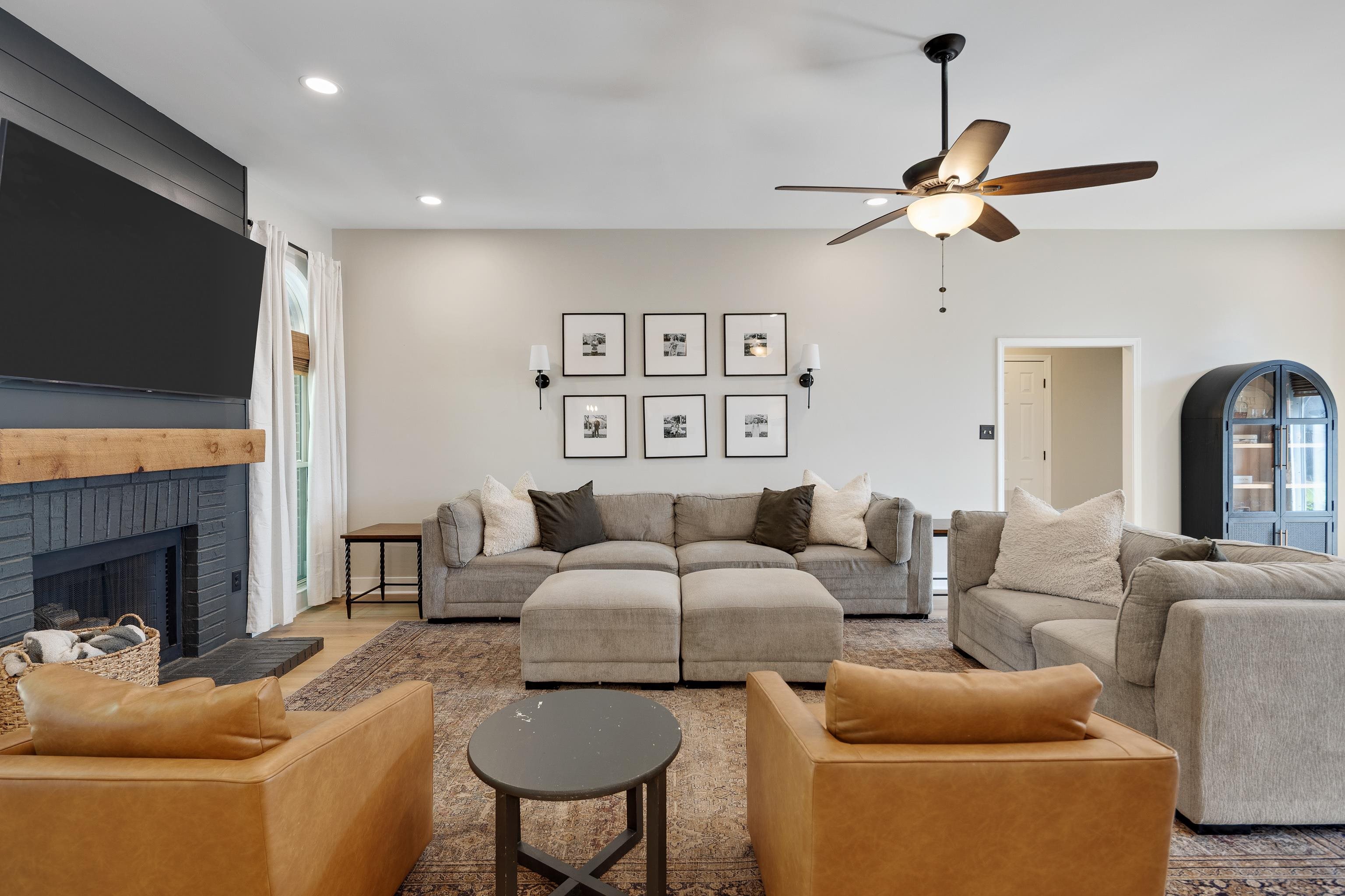 288 Hughes Cove Collierville, TN 38017 - Photo 8 of 31 Living area with recessed lighting, a fireplace, ceiling fan, wood finished floors, and vaulted ceiling