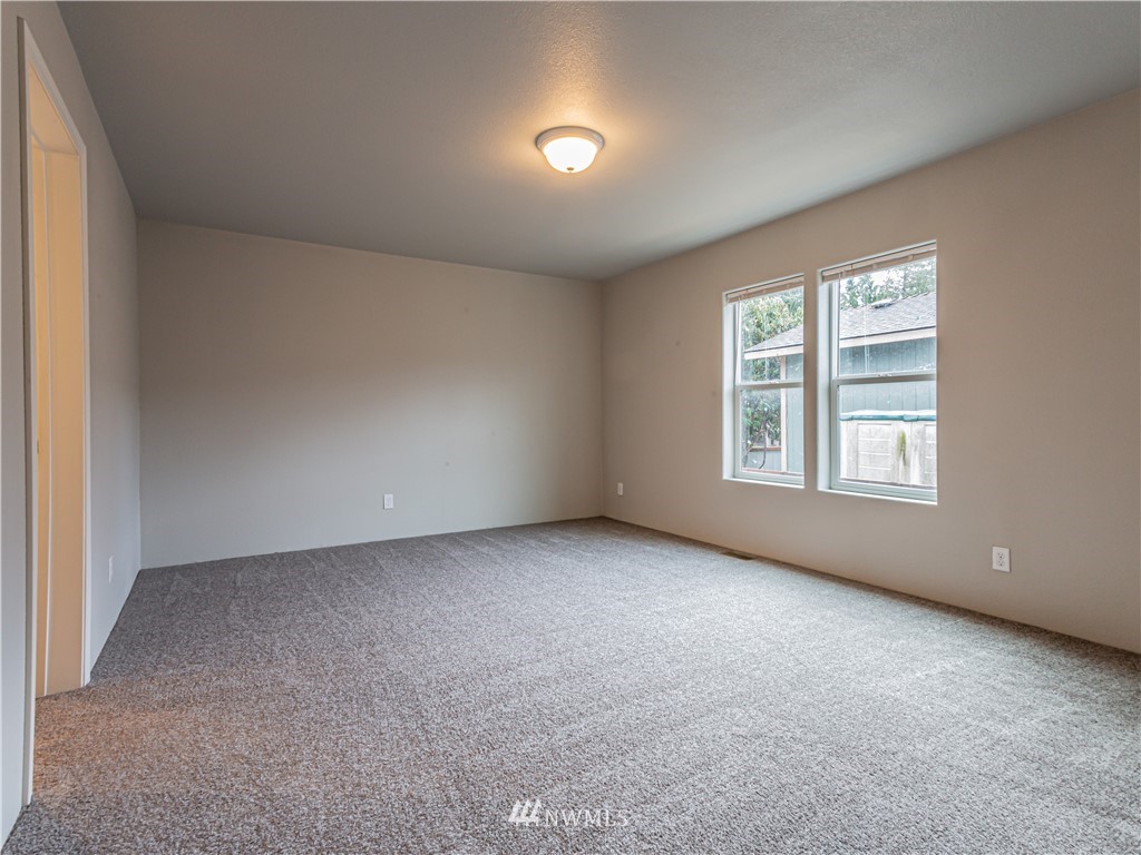 4547 Decatur Drive Ferndale, WA 98248 - Photo 25 of 30 an empty room with windows and closet