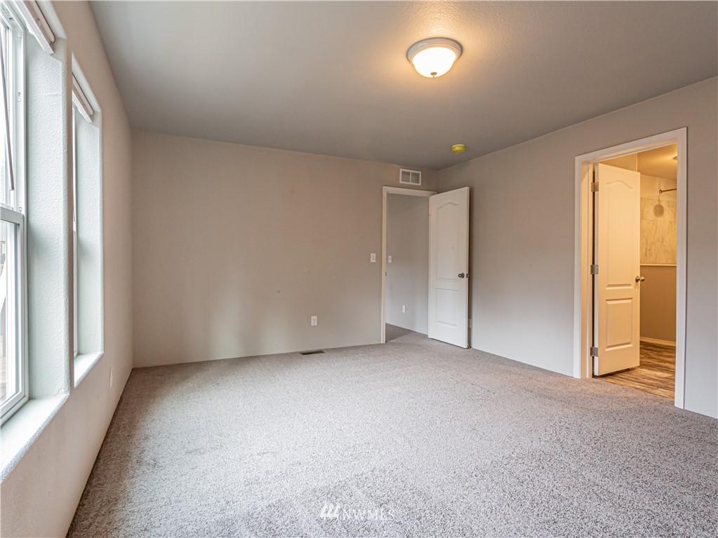 4547 Decatur Drive Ferndale, WA 98248 - Photo 26 of 30 an empty room with a empty space and windows