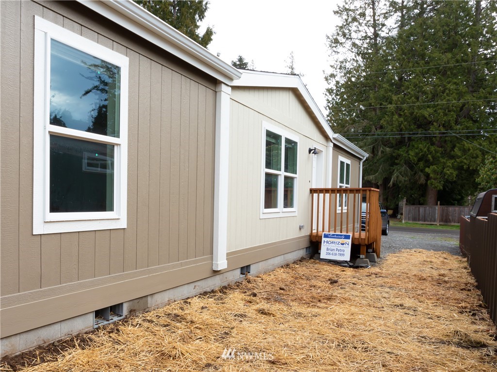4547 Decatur Drive Ferndale, WA 98248 - Photo 30 of 30 a backyard of a house with barbeque oven table and chairs