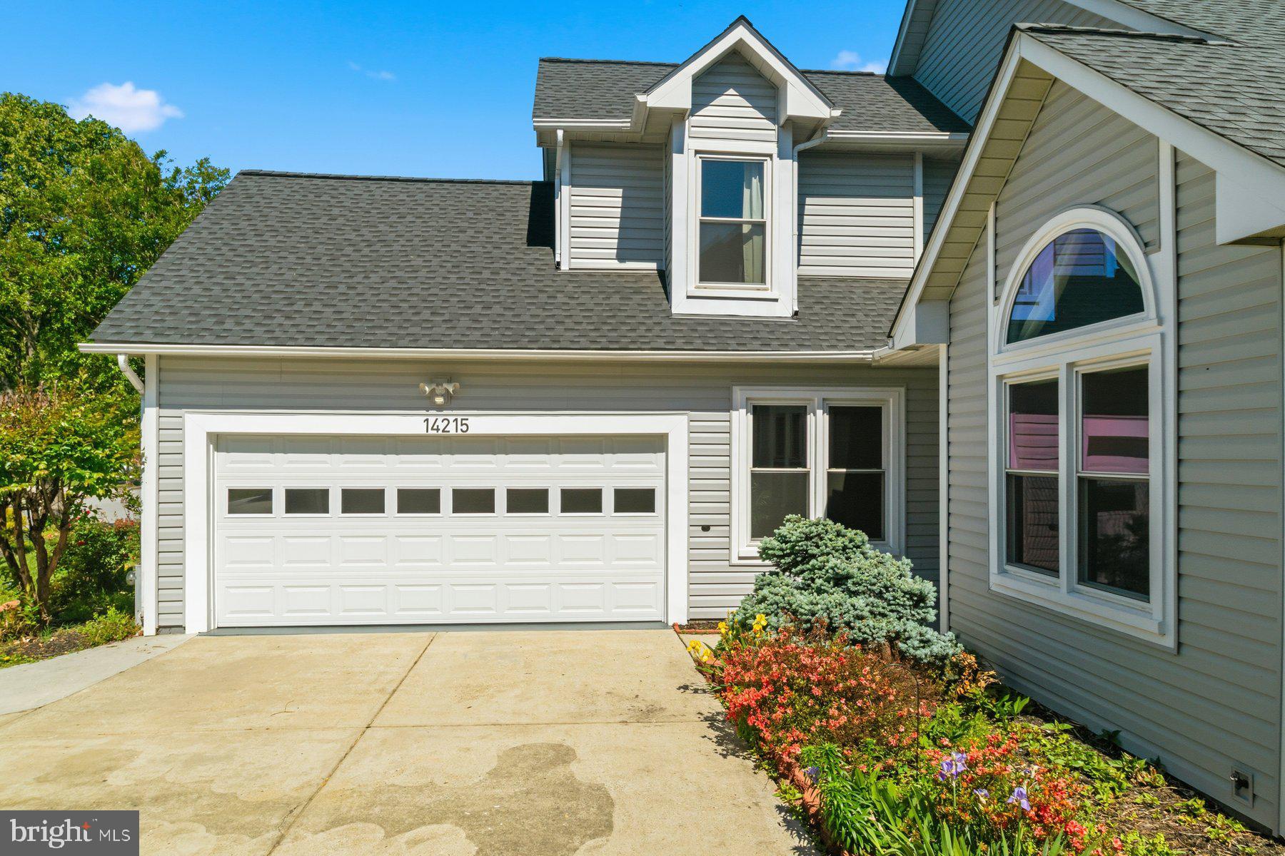 14215 Greenview Drive Laurel, MD 20708 - Photo 2 of 35 a front view of a house with a yard