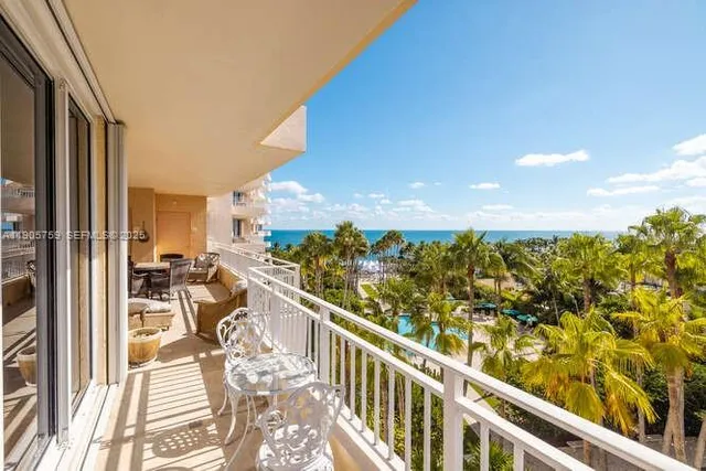a view of a balcony with city view