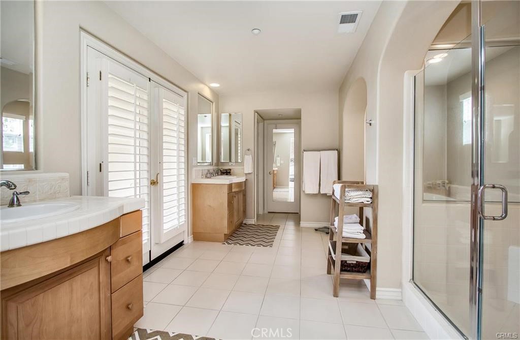 3 Weldon Heights Ladera Ranch, CA 92694 - Photo 7 of 13 a kitchen with a refrigerator and a sink
