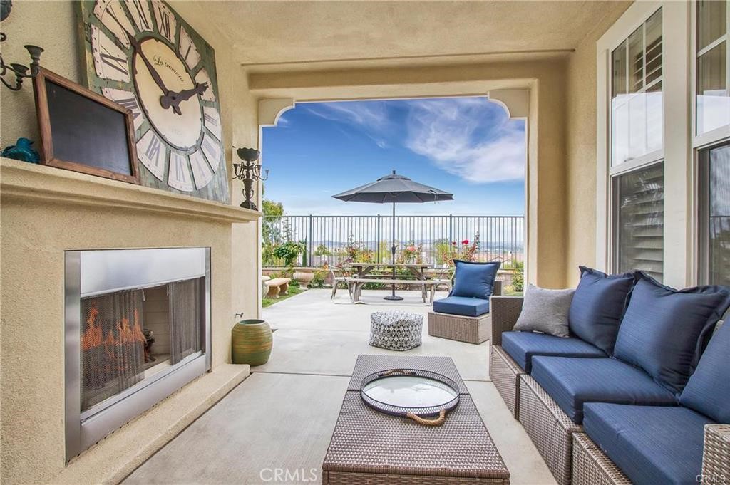 3 Weldon Heights Ladera Ranch, CA 92694 - Photo 8 of 13 a living room with furniture and a fireplace