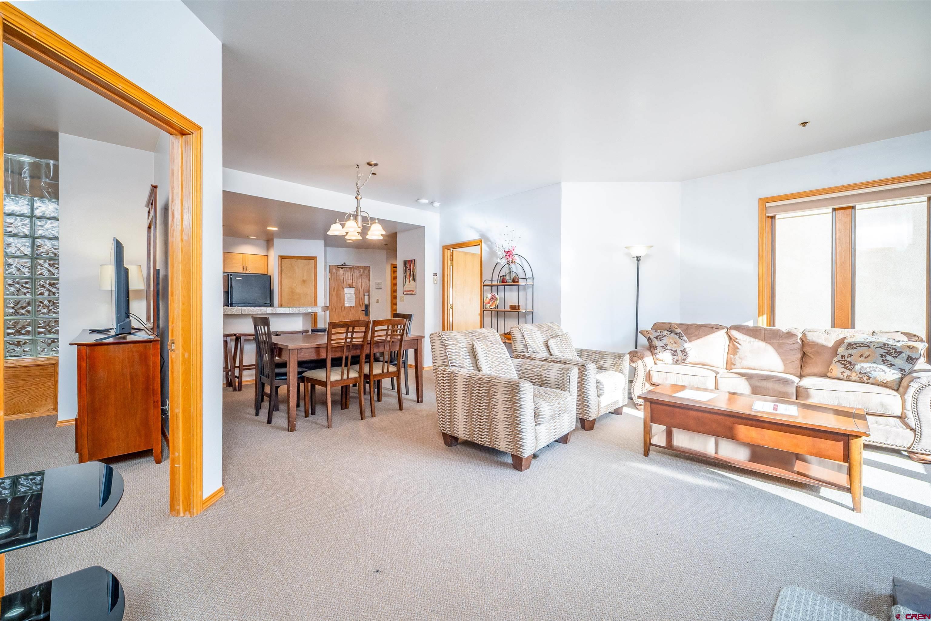 71 East Needles Road, Unit 331 Durango, CO 81301 - Photo 3 of 40 a living room with furniture and a table