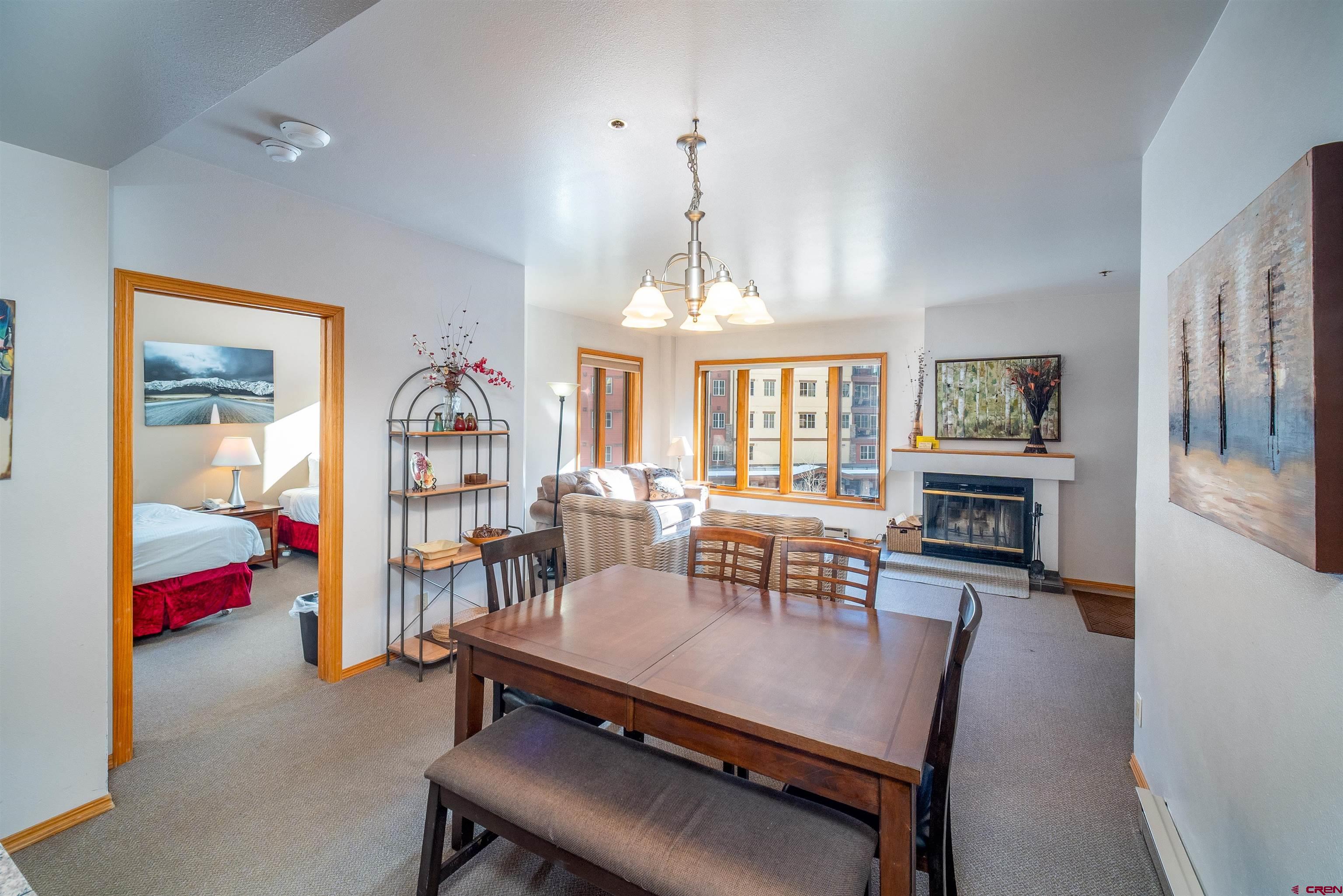 71 East Needles Road, Unit 331 Durango, CO 81301 - Photo 7 of 40 a dining room with furniture window and wooden floor