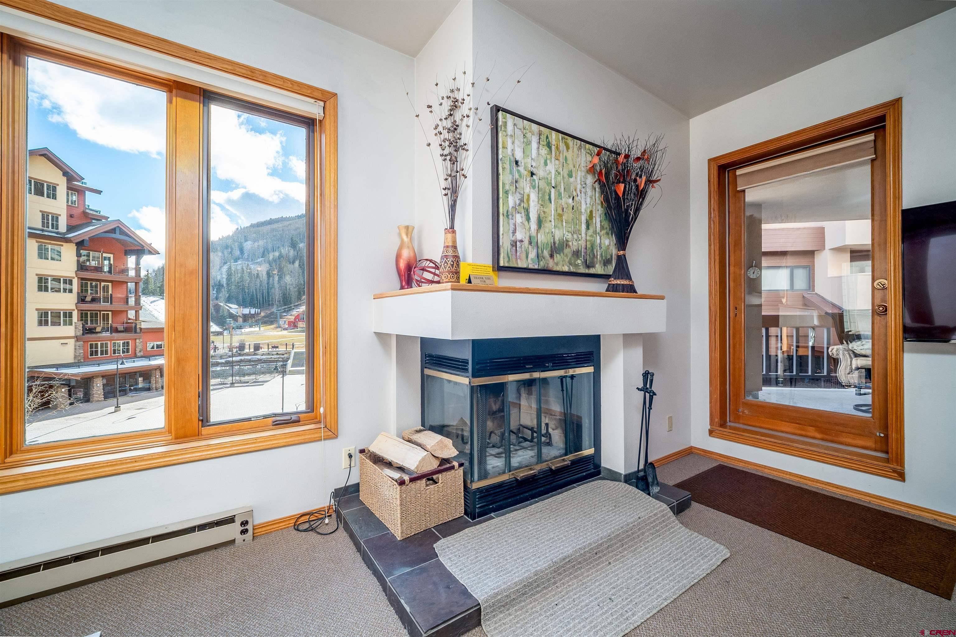71 East Needles Road, Unit 331 Durango, CO 81301 - Photo 8 of 40 a living room with furniture and a fireplace