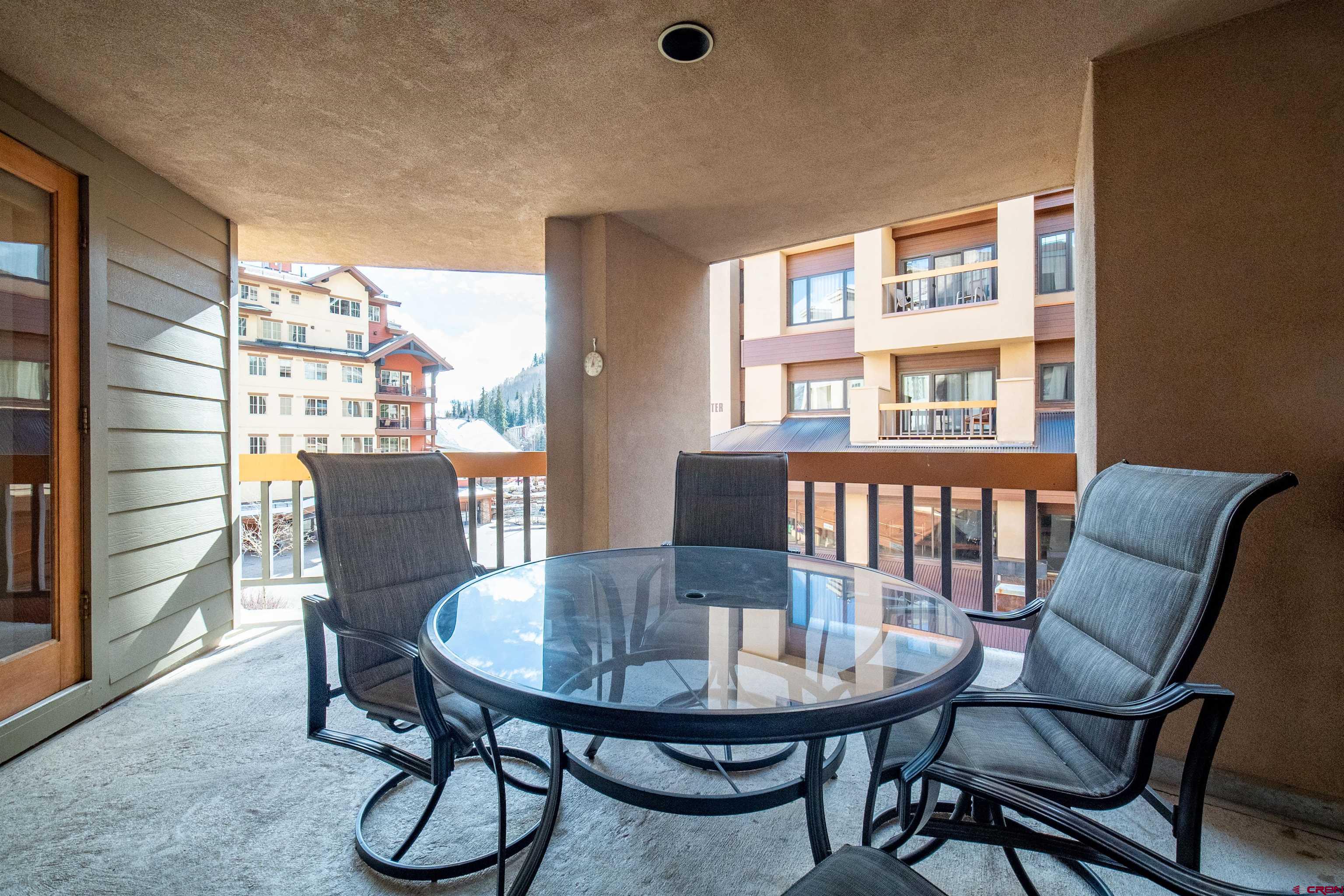 71 East Needles Road, Unit 331 Durango, CO 81301 - Photo 10 of 40 a view of a dining room with furniture window and wooden floor