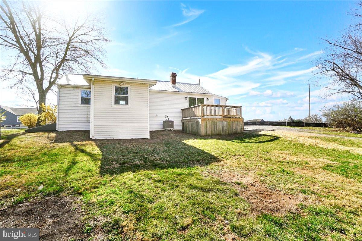 22310 Clarksburg Road Boyds, MD 20841 - Photo 29 of 47 a view of a house with a yard and garage