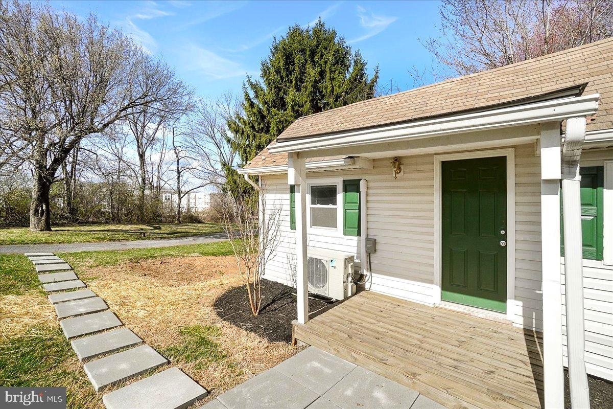 22310 Clarksburg Road Boyds, MD 20841 - Photo 32 of 47 a view of a house with backyard and trees