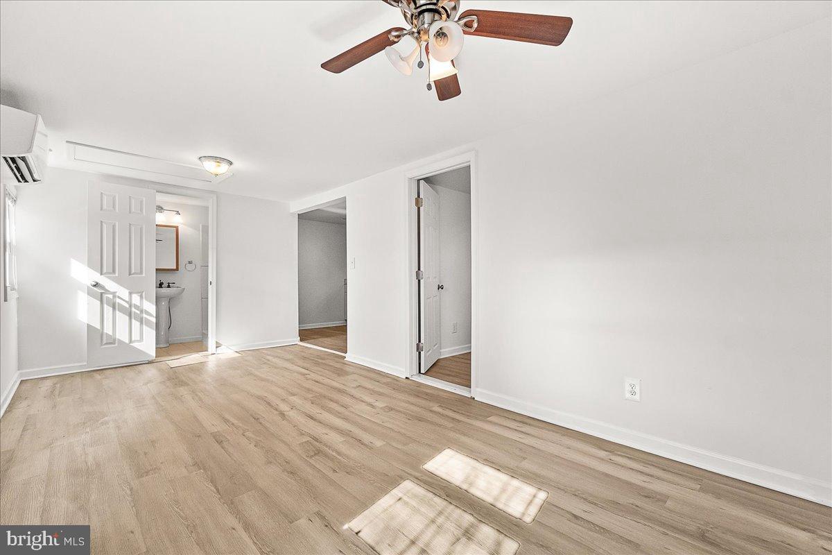 22310 Clarksburg Road Boyds, MD 20841 - Photo 34 of 47 a view of empty room with wooden floor