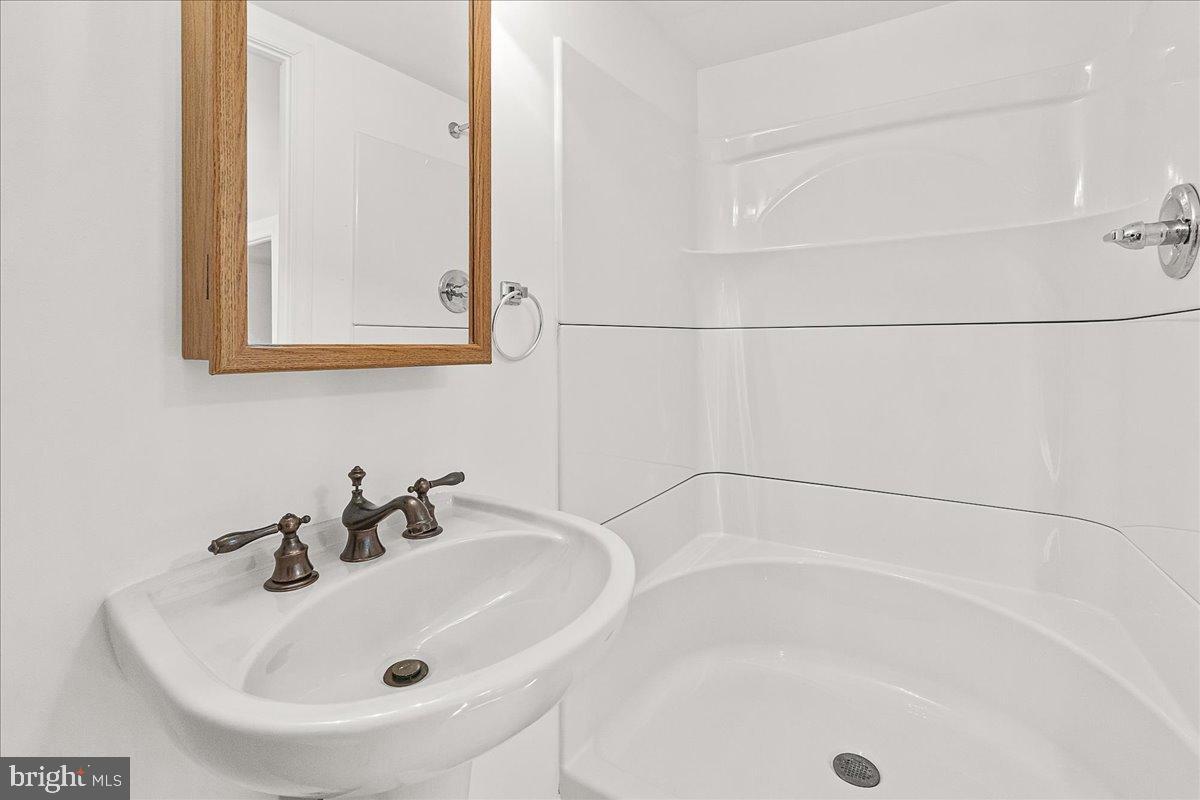 22310 Clarksburg Road Boyds, MD 20841 - Photo 40 of 47 a bathroom with a tub