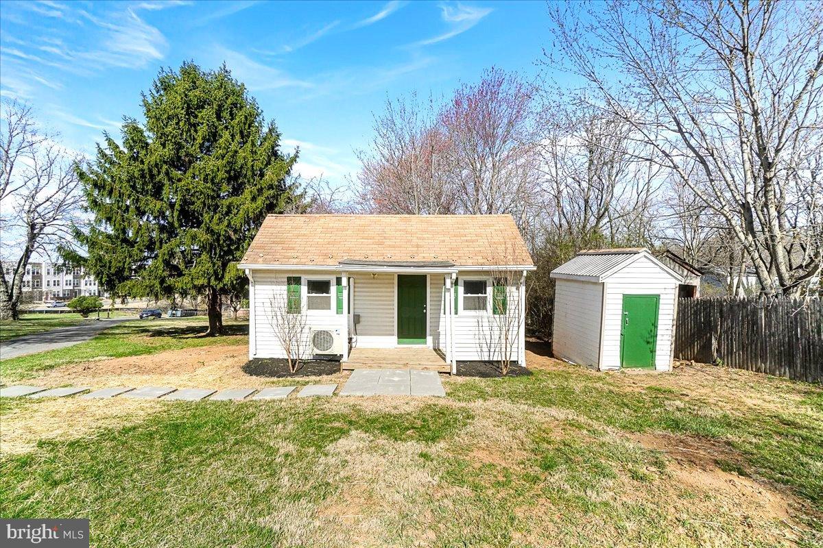 22310 Clarksburg Road Boyds, MD 20841 - Photo 42 of 47 a front view of a house with a yard