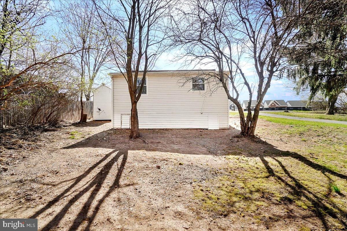 22310 Clarksburg Road Boyds, MD 20841 - Photo 43 of 47 a view of a backyard with large trees