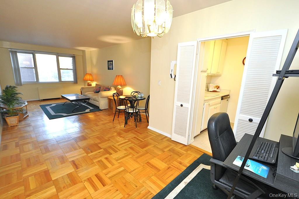 260 Garth Road, Unit 4A5 Scarsdale, NY 10583 - Photo 21 of 35 a living room with furniture and a table