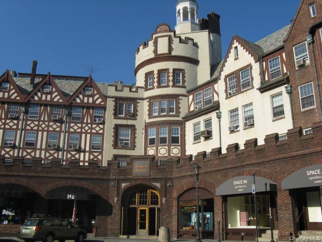 260 Garth Road, Unit 4A5 Scarsdale, NY 10583 - Photo 27 of 35 a front view of building with a lot of windows and covered