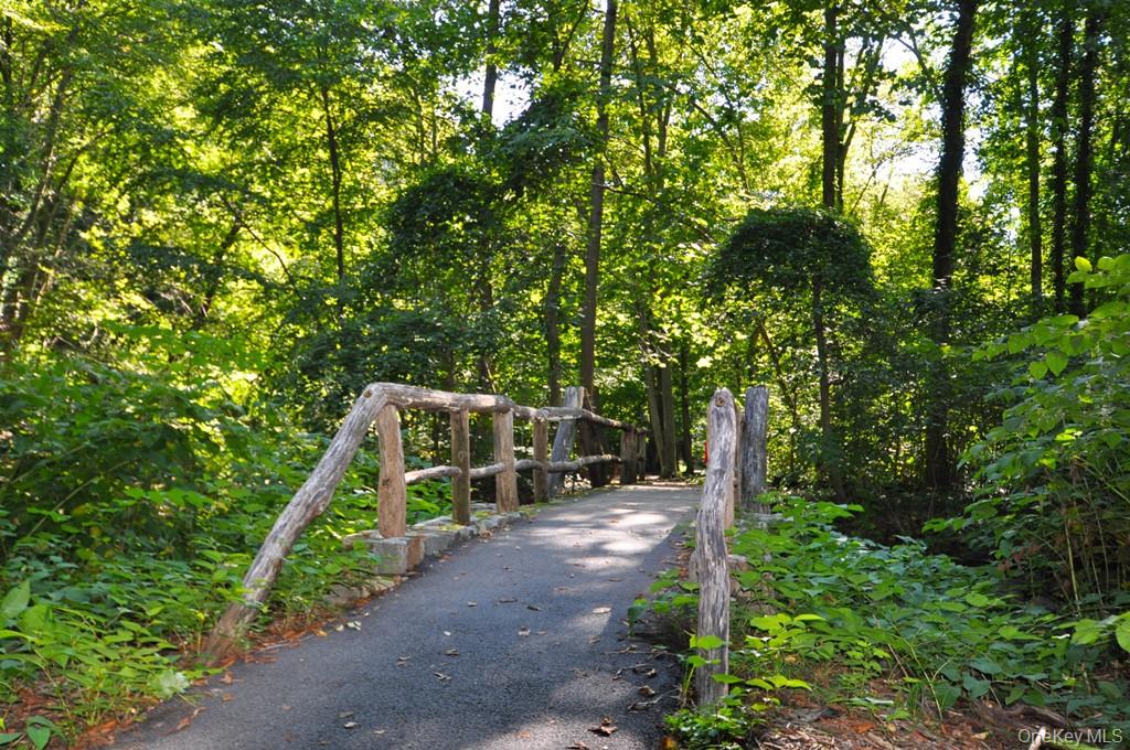 260 Garth Road, Unit 4A5 Scarsdale, NY 10583 - Photo 28 of 35 Bronx River Bike, Jogging and Walking Trail: – The Bronx River trail is a11.2 mile paved pathway from Palmer Road in the village of Bronxville to the Kensico Dam Plaza in Valhalla. The path travels crossovers the Bronx River many times traveling thru the Garth Woods reserve and runs parallel with the Bronx River Parkway Garth Road residents can access the trail at either end of Garth Road.